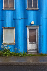 Corrugated metal facade in blue color. Traditional icelandic house. Iceland