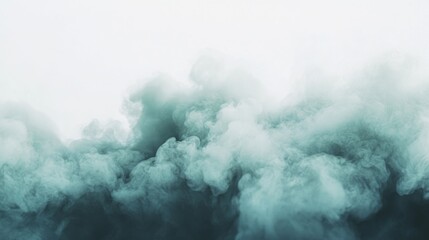 Fototapeta premium Dramatic, teal-toned smoke clouds against a white backdrop