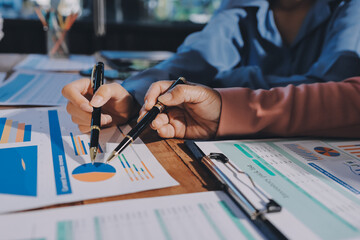 Business analyze,Close up Business people meeting to discuss the situation on the market. Business...