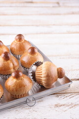 a tray of brioche sweet bread on white wooden background