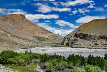 mountain landscape with lake and blue sky