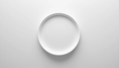 Minimalist white plate display studio environment product photography simple composition top view clean aesthetic for contemporary dining