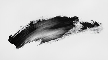 Dynamic black brush stroke on white background highlighting artistic expression and texture in modern art