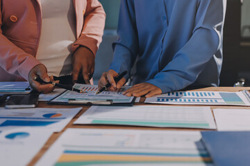 Business analyze,Close up Business people meeting to discuss the situation on the market. Business Financial Concept