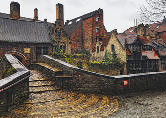 Old town in Europe with vintage effect. Bruges, Belgium. Traditional houses in Bonifacius Bridge, Bruges