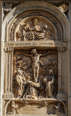 An old crucifixion relief sculpture outside St. Stephen's Cathedral in Vienna