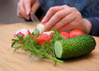 Chopping veggies for a fresh salad
