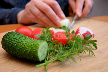 Chopping fresh veggies for a vibrant salad