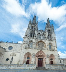 Majestic Gothic Cathedral Under Vibrant Blue Sky