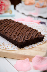 a whole brownies cake on a wooden board