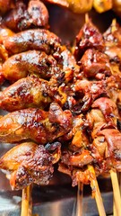 Grilled Chicken Hearts on Skewers Display