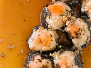 Delicious Sushi Balls with Sweet Sauce Topping