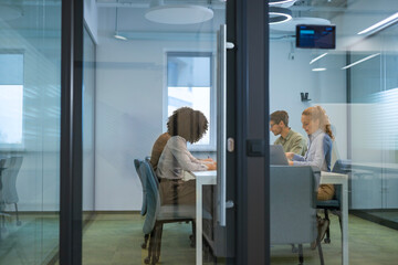 Business office with blurred people casual wear, with blurred bokeh background