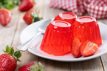 Fresh strawberry jelly of on wooden table