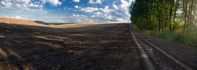 Agro-industrial fields of Ukraine. Black earth lands of the central zone of Ukraine. Endless expanses of endless fields. Plowed fields.
