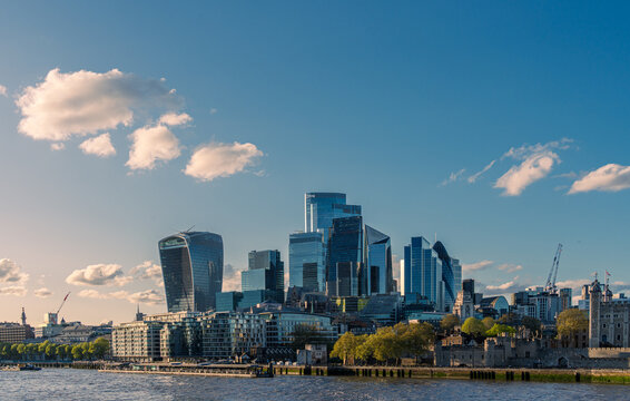 London skyline showing the city of london financial district and tower of london under a cloudy sky