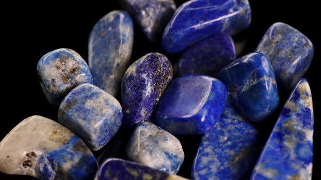 Lapis Lazuli Stones Spinning on Black Background