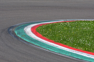colored curb on a racing track