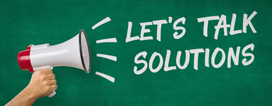 Naklejki A man holding a megaphone - Lets talk solutions