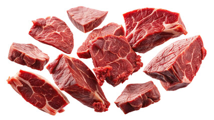 Fresh chunks of raw beef falling through the air on white background