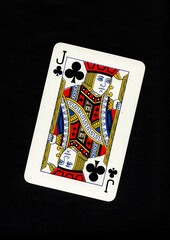 A playing card in the suit of clubs isolated on a black background.