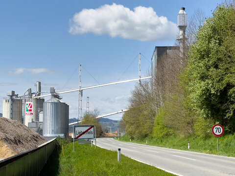 Rural industrial landscape with silos and road near liebenfels