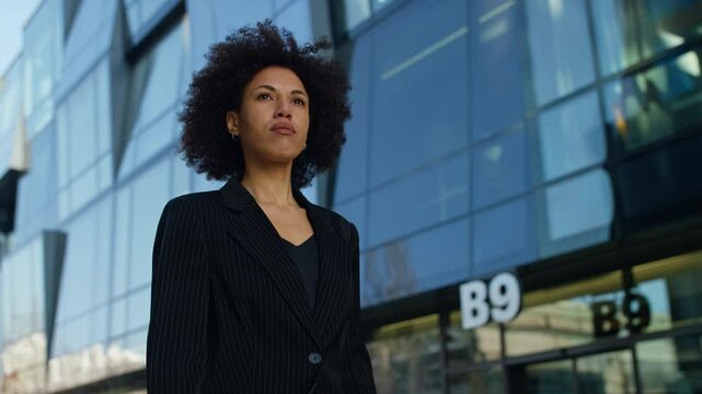 Confident Woman Walking to Work in City
