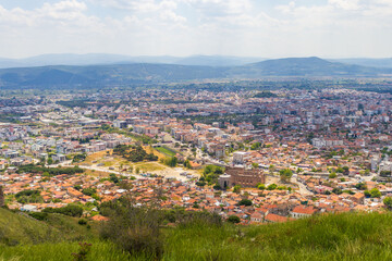 Wide angle shot of Bergama(pergamon) city center with iconic houses and Red Hall Basilica.