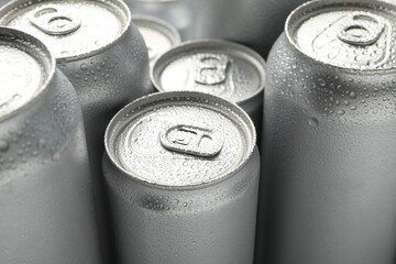 Many different tin cans as background, closeup
