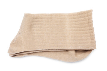 Pair of beige socks isolated on white, top view