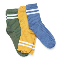 Many different pairs of socks isolated on white, top view