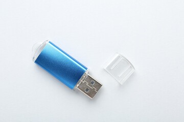 One flash drive on white background, top view
