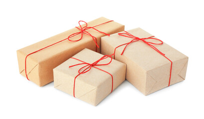 Many gift boxes wrapped in kraft paper isolated on white