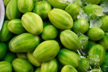 Vendor Selling fresh fruit. Street food of Thailand.