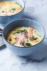Zuppa toscana soup with sausage, bacon and potatoes.