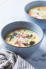 Zuppa toscana soup with sausage, bacon and potatoes.