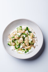 Butter bean salad with yogurt, cucumber and feta.