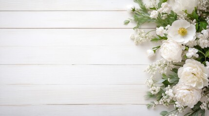 Elegant white floral arrangement on a light wood background. 