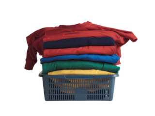 Wicker basket with a stack of colorful clothes on a white background