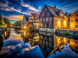 Naklejka premium Night Photography: City Water Mill - Illuminated Architecture & Reflections