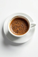 Fototapeta premium Small cup of rich espresso, clean white backdrop , texture, hot beverage