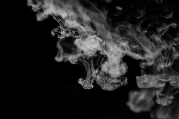 White smoke on a black background