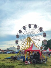 ferris wheel in PASAR RAKYAT (TRADITIONAL MARKET)  FESTIVAl at Alun Alun Kidul surakarta  town square of surakarta 20 april 2025 indonesia 