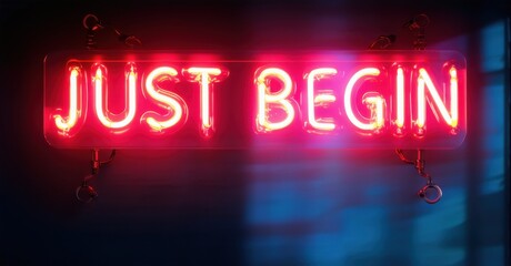 Bright neon sign displays words Just Begin. Red glow contrasts dark background. Inspiring message, simple design.