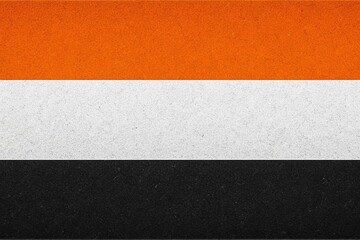 Fototapeta premium Abstract Flag Design in Orange, White, and Black, noise texture effect, large banner copy space, Textured Background, Noise Background