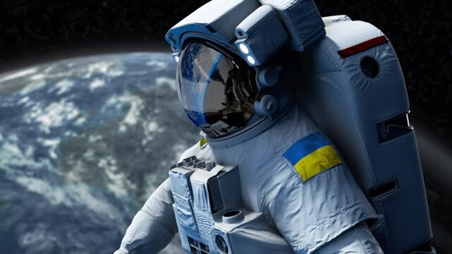 Ukraine Astronaut with arm patch flag floating through space. Space program. Spaceman. Earth in background. The country showing national pride. 