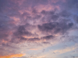 Purple stormy evening sky at sunset in early spring