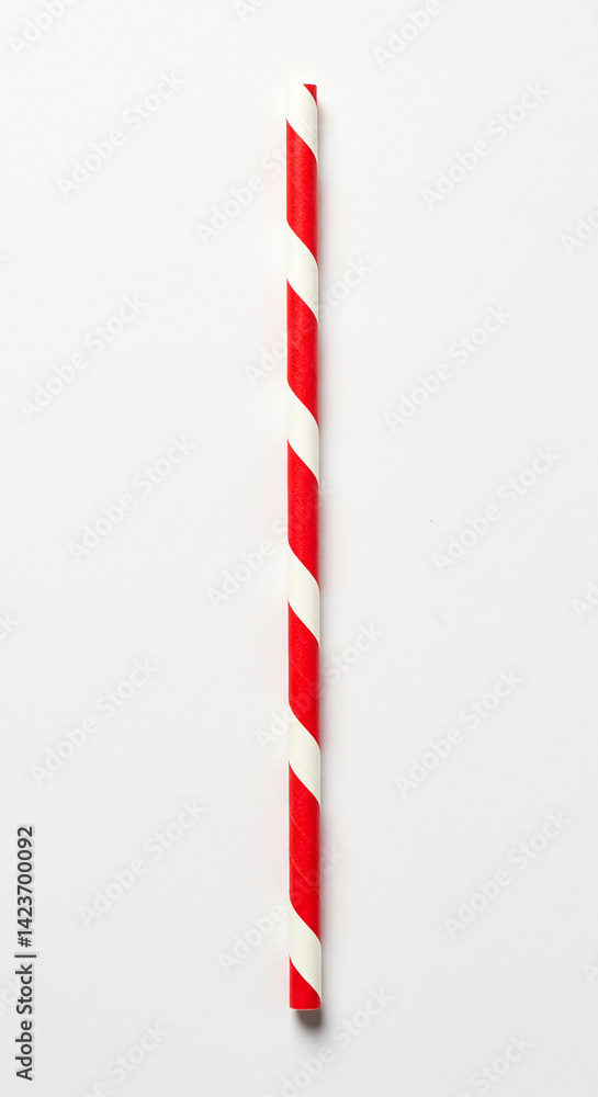 Poster paper straw with red and white stripes. drinking tube stands against a plain background. simple sing