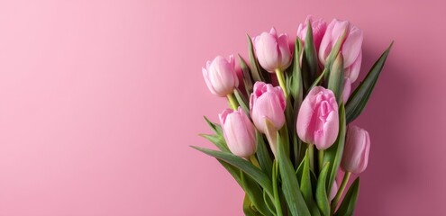 Obraz premium Pink Tulips Bouquet: Delicate Spring Flowers on Pink Background, Beauty in Nature, Floral Arrangements, Close-up View
