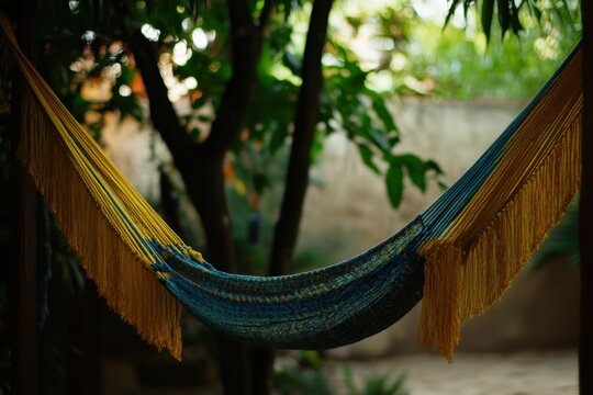 Relaxing in a colorful hammock surrounded by lush greenery on a sunny day